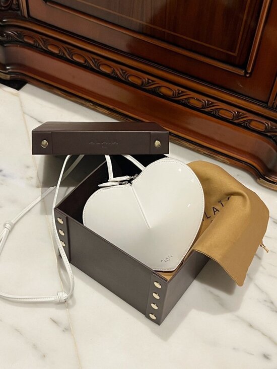 Alaia Handbags - ALAÏA White Patent Leather Heart Crossbody Bag